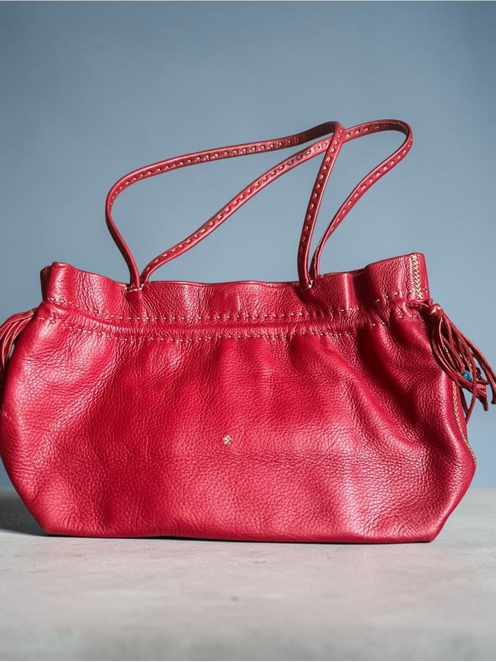 Henri Cuir Red Leather Shoulder Bag with Tassel Detail